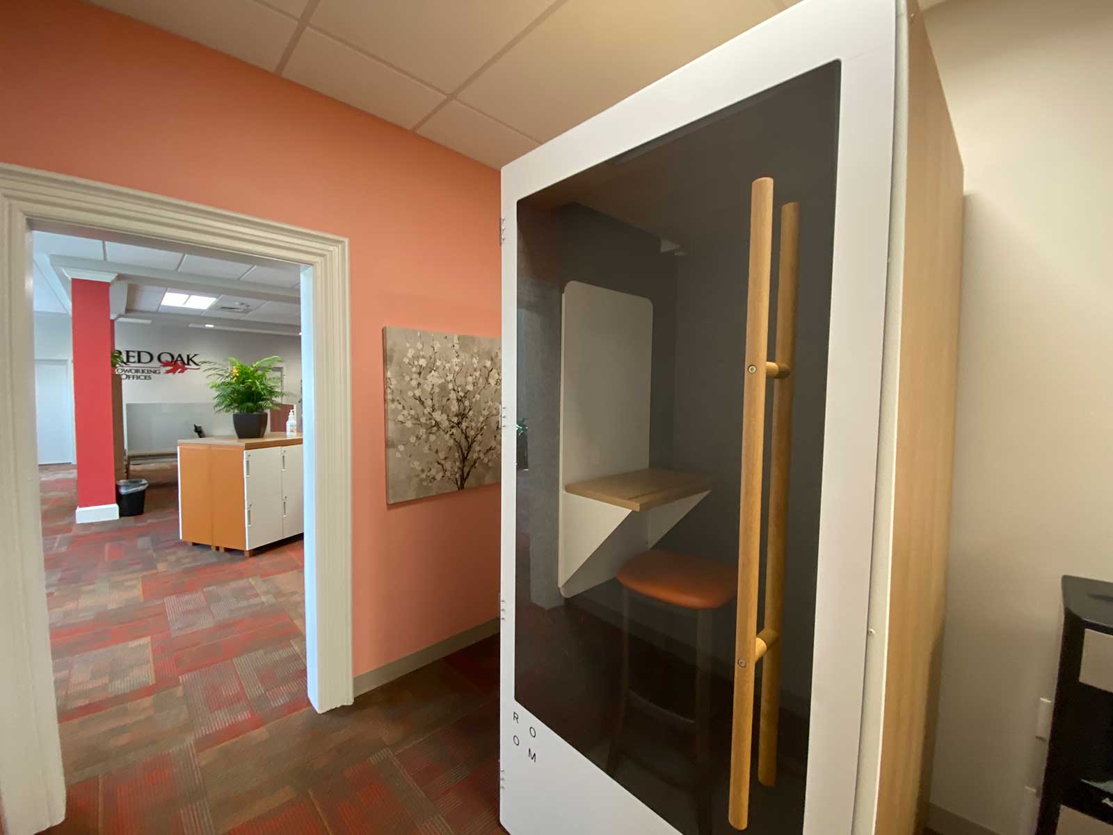 Coworking with a cell phone booth