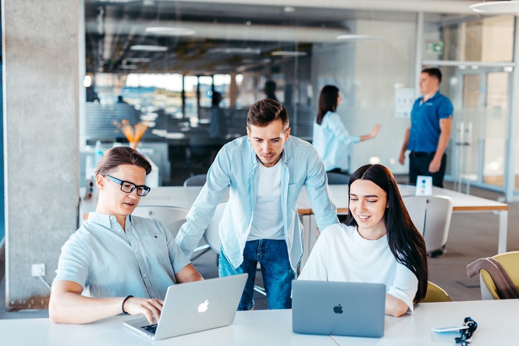 Workers showing Coworking for Remote Teams: Boosting Productivity and Collaboration