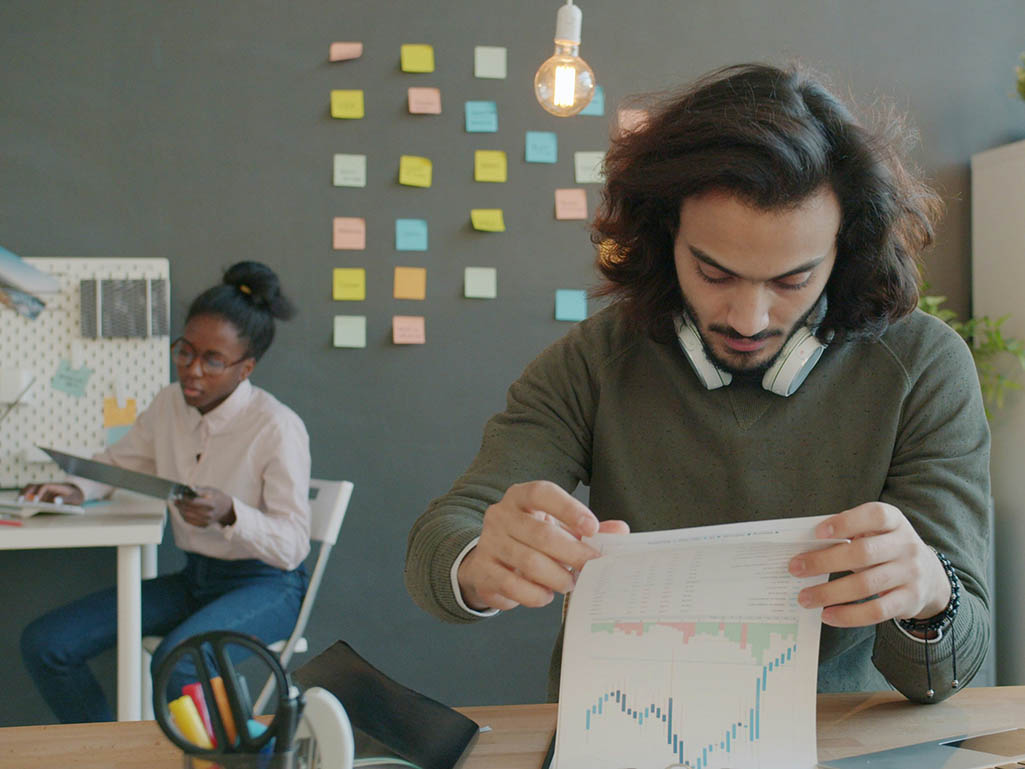 Several workers looking organized implying goal setting